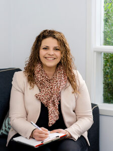 Maria Kampantais smiling, in a portrait photograph